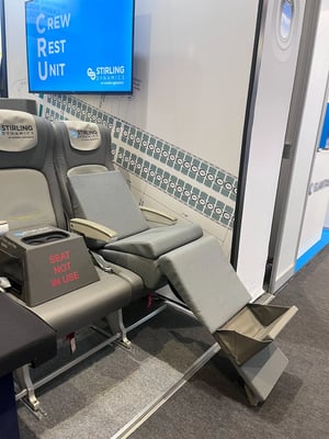 stirling-dynamics-AIX-2025-crew-rest-unit-seat-blocker-on-stand