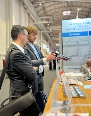 stirling-dynamics-AIX-2025-intoducing-products-on-stand-life-vest-container